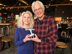 Gail Keller Smith and Jim Newsom accept the 2022 VEER Music Award